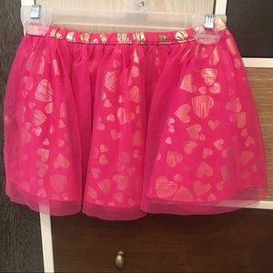 Pink skirt w gold heart pattern